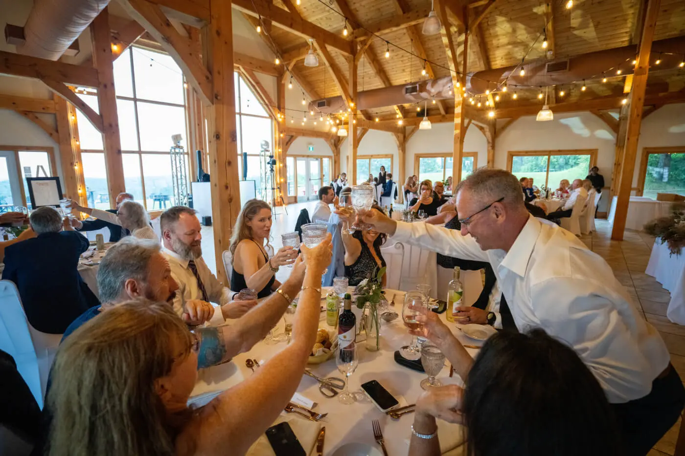 People gathered around a wedding table