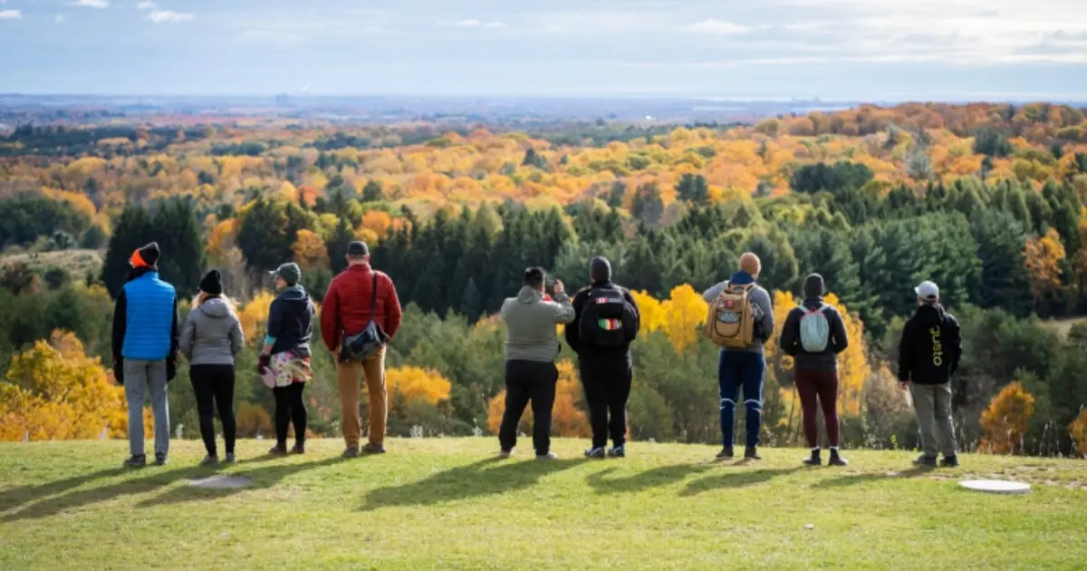 og-image-about People over looking fall colors